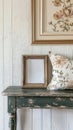 Rustic Console Table Decor with Ornate Frame and Floral Pillow