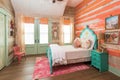 rustic cottage bedroom with whimsical and colorful accents