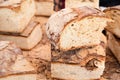 Rustic country bread freshly prepared on the Sunday market in Italy Royalty Free Stock Photo