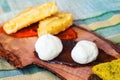 Rustic Cretan cheese board with local cheeses and jam