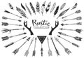 Rustic decorative antlers, arrows and feathers. Hand drawn vintage vector design set. Royalty Free Stock Photo