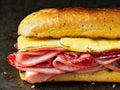 Rustic deli cold cuts sandwich Royalty Free Stock Photo