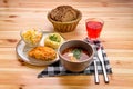 Chicken fillet in breading, mashed potato and pickle cabbage with saltwort soup, brown bread and a glass of Royalty Free Stock Photo