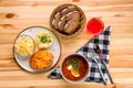 Chicken fillet in breading, mashed potato and pickle cabbage with saltwort soup, brown bread and a glass of Royalty Free Stock Photo