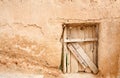 Rustic door and adobe wall Royalty Free Stock Photo