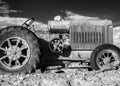 Rustic early farm tractor Royalty Free Stock Photo