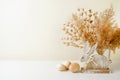 Rustic Easter Decorations with wooden rabbit, eggs and pampas grass, copy space