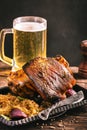 Rustic eisbein with braised cabbage and beer