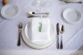 Rustic elegant place setting in white tones. Royalty Free Stock Photo