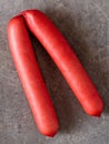 Rustic english saveloy red pork sausage Royalty Free Stock Photo