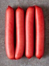 Rustic english saveloy red pork sausage Royalty Free Stock Photo