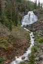 Rustic Falls Drains into River