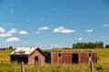 Rustic farm buildings in a field. Rockyview County,Alberta,Canada Royalty Free Stock Photo