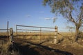 Rustic farm gate and hay bales Royalty Free Stock Photo