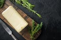 Rustic farmhouse inspired butter, on black background, top view flat lay