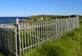 Rustic fence along the shoreline