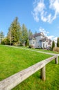 Rustic fence with house in the background