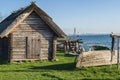 Rustic fisherman utility house and boats at sea coast Royalty Free Stock Photo