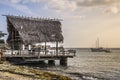 Rustic fishing pier in Curacao at sunset