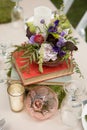 Rustic Floral Centerpiece with books Royalty Free Stock Photo