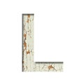 Rustic font. The letter L cut out of paper on the background of old rustic wall with peeling paint and cracks. Set of simple