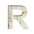 Rustic font. The letter R cut out of paper on the background of old rustic wall with peeling paint and cracks. Set of simple