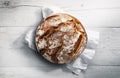 Fresh rustic bread on a wooden table