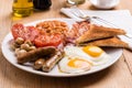 Rustic full english breakfast Royalty Free Stock Photo