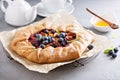 Rustic gallette pie with peaches and blueberry Royalty Free Stock Photo