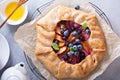 Rustic gallette pie with peaches and blueberry Royalty Free Stock Photo