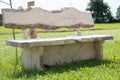 Rustic garden bench made of solid wood Royalty Free Stock Photo