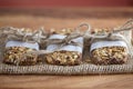 Rustic Granola Bars wrapped with Twine on Burlap Red BG