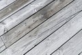 Rustic gray wooden planks in diagonal rows. Full-frame background with copy space