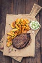 Rustic grilled beefsteak with french fries