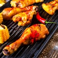 Rustic Grilled chicken wings,legs,and spicy corn