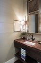 Rustic half bathroom with antique fittings