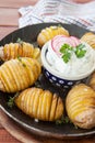 Rustic hasselback potatoes Royalty Free Stock Photo