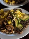 Rustic healthy whole foods egg, avo and mushroom breakfast