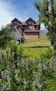 Rustic home with gables and red tile roof in Puerto Natales, Patagonia Chile