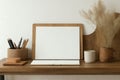 Rustic Home Office with Blank Notebook and Desk Accessories Royalty Free Stock Photo