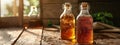 Rustic Honey Bottles on Wooden Table Royalty Free Stock Photo