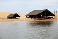 The river, huts and the sand dunes. MaranhÃÂ£o state, Brazil