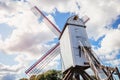 Rustic wooden windmill in idyllic Bruges public park, Belgium Royalty Free Stock Photo