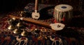 Rustic Indian musical instruments on a rich carpet Royalty Free Stock Photo