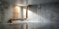 Rustic industrial corner a weathered pipe rests against a textured concrete wall, illuminated by a single light source. Royalty Free Stock Photo