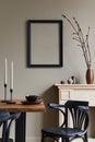 Rustic interior design of dining room with wooden family table, retro chair, cup of coffee, decoration, mock up frame.