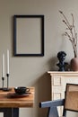 Rustic interior design of dining room with wooden family table, retro chair, cup of coffee, decoration, mock up frame.