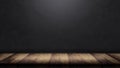 Old wood table with blurred concrete block wall in dark room background Royalty Free Stock Photo
