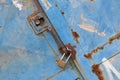 Rustic iron door with closed padlock Royalty Free Stock Photo