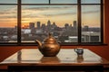 a rustic iron teapot on a conference table with a panoramic city view through the window